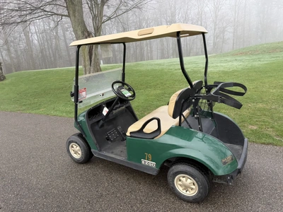 (1) 2014 E-Z-Go golf cart with a Kawasaki gas engine, does not include Club canopy, ball carrier, fo...
