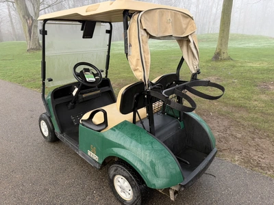 (1) 2017 E-Z-Go golf cart with a Kawasaki gas engine, model 625111G01, includes canopy, ball cover, ...