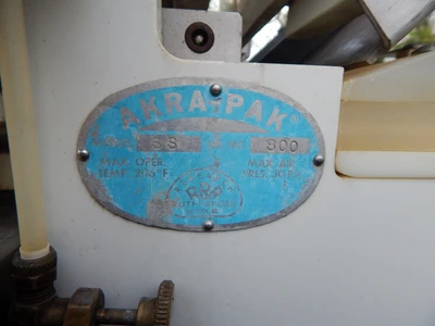 USED AKRAPAK CUP FILLER SS