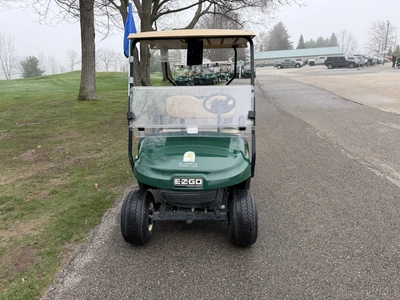 (1) 2015 E-Z-Go golf cart with a Kawasaki gas engine, does not include Club canopy, includes ball wa...