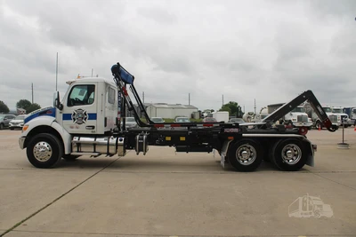 Used 2027 PETERBILT 548 Hooklifts & Roll-Offs Texas US | Roll Off Truck World #1491992