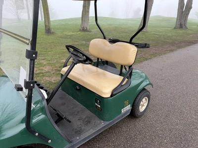 (1) 2014 E-Z-Go golf cart with a Kawasaki gas engine, includes canopy, ball carrier, fold-down winds...