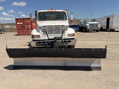 Used 1999 INTERNATIONAL 4700 4X2 WITH 10' SNOW DOGG PLOW Flatbed Trucks Michigan US | Miedema Asset Management Group #1410944