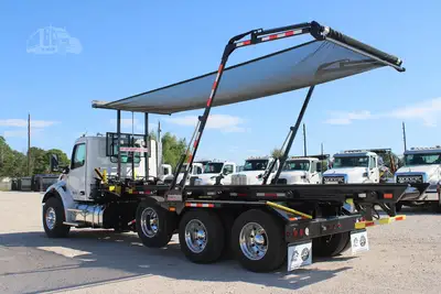 New | in-Stock 2027 PETERBILT 548 Rolloff Trucks Texas US | Roll Off Truck World #1492018