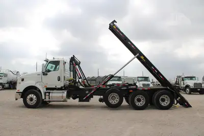 New | in-Stock 2026 INTERNATIONAL HX Rolloff Trucks Texas US | Roll Off Truck World #1491797