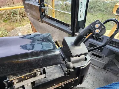 Used 2004 CATERPILLAR 990 Skid Steer Loaders British Columbia CA | Lenmark #277799