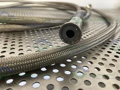 USED 20 FT STAINLESS STEEL HOSE W/ 1/2" SANITARY FITTING TO 1" SANITARY FITTING