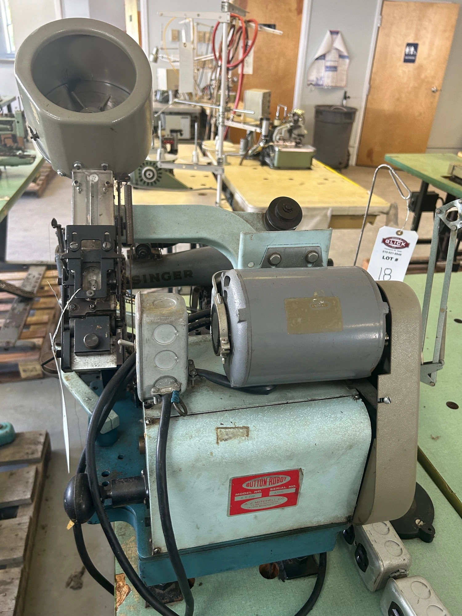 Singer 114-33 Sewing Machine w/ A.J. Mitchell Button Robot