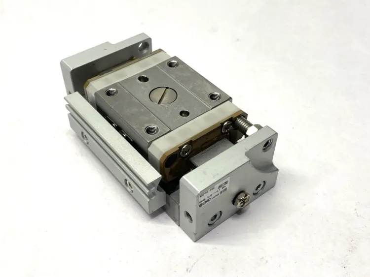 Used SMC PNEUMATIC SLIDE TABLE MISSING SHOCK ABSORBER Linear Actuators | Maverick Industrial Sales #1100192