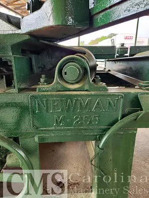 USED NEWMAN M-255 AUTOMATIC FEED TABLE