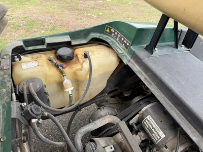 (1) 2015 E-Z-Go golf cart with a Kawasaki gas engine, does not include Club canopy, includes ball wa...