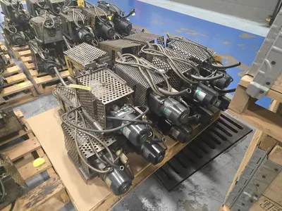 Approx (16) Drum Feeders on Pallet