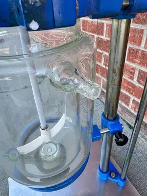 USED CHINA 5 LITER JACKETED GLASS REACTOR W/ CHINA OVERHEAD STIRRER