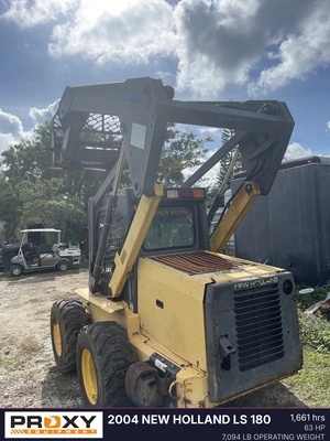 Used 2004 NEW HOLLAND LS 180 Skid Steer Loaders Florida US | Proxy Equipment #1377902