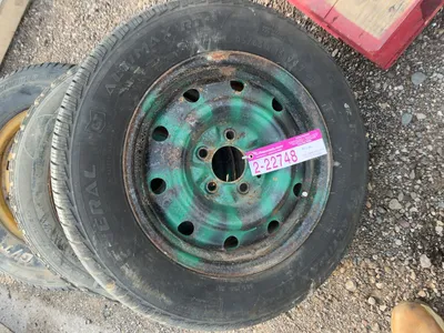 Lot of (1) General Size 205/65R15 Tire on Steel 5-lug Wheel, (1) General 185/60R15 Tire on Steel 5-l...