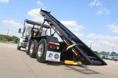 New | in-Stock 2027 PETERBILT 548 Rolloff Trucks Texas US | Roll Off Truck World #1492013
