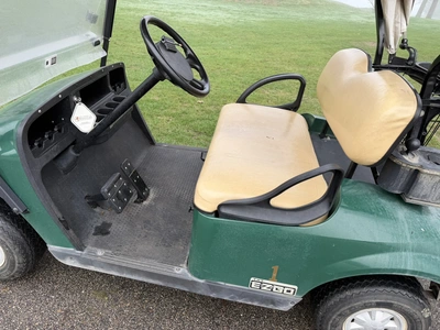 (1) 2015 E-Z-Go golf cart with a Kawasaki gas engine, includes canopy, fold-down windshield, and bal...