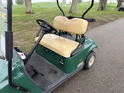 (1) 2014 E-Z-Go golf cart with a Kawasaki gas engine, does not include Club canopy, ball carrier, fo...