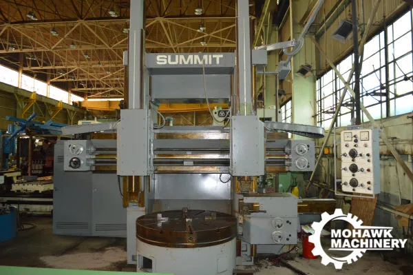 59" SUMMIT VERTICAL BORING MILL w/(2) SWIVELING RAM HEADS & 4-JAW FACEPLATE