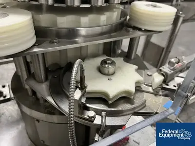 Unknown Rotary Capper, with Conveyor