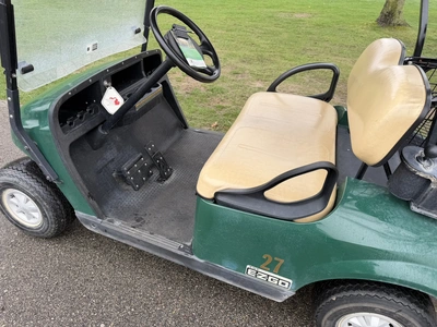 (1) 2015 E-Z-Go golf cart with a Kawasaki gas engine, does not include Club canopy, includes ball wa...