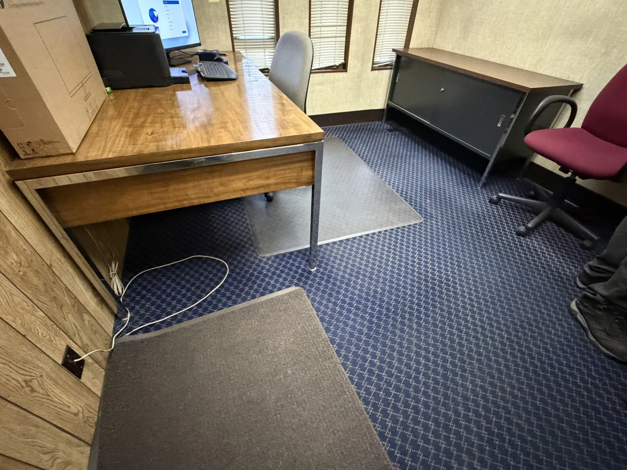 Contents of office furniture, includes (1) steel frame, wood desk, 76" x 38", (2) rolling office cha...