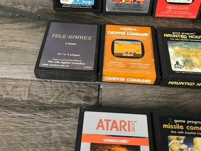 19 - Atari Video Games & 2 Paddle Controllers - see description for more info