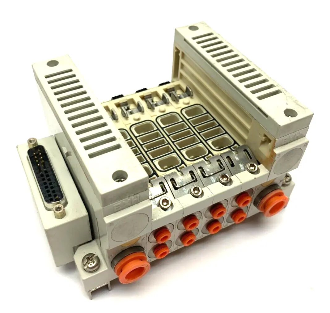 VV5Q11-04N3FS0-D0RS | SMC  Plug In Manifold Assembly 4-Port - Used