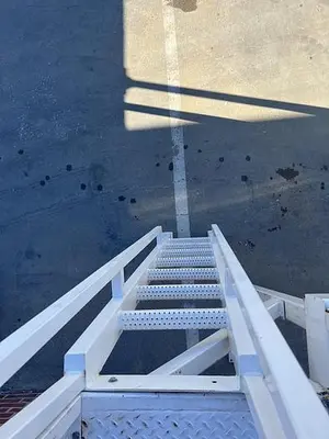 USED HEAVY DUTY CORNER MEZZANINE / MACHINE PLATFORM  154" X  117" X  136"