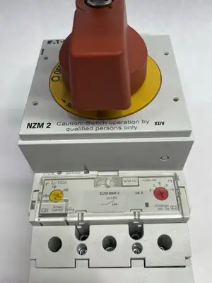 USED EATON MOLDED CASE CIRCUIT BREAKER W/ NZM2-XDV SWITCH ACCESSORY