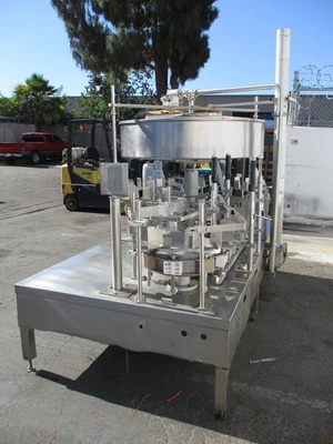 Gravity feed, 1 gallon bottle filling machine w/ 24 heads