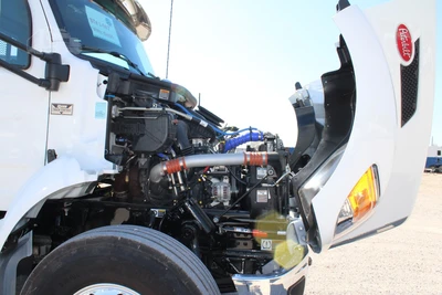 New | in-Stock 2027 PETERBILT 548 Hooklifts & Roll-Offs Texas US | Roll Off Truck World #1492004