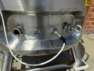 USED PRECISION 250 LITER STAINLESS STEEL JACKETED REACTOR 45 PSI W/ LIGHTNIN MIXER.