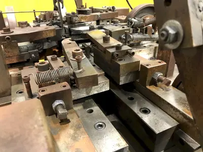 FOUR SLIDE WIRE FORMING MACHINE: STOCK #18987