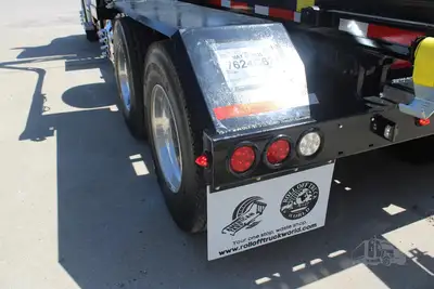 New | in-Stock 2027 PETERBILT 548 Rolloff Trucks Texas US | Roll Off Truck World #1492012