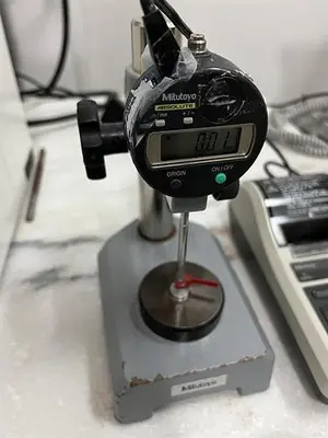 Mitutoyo model 7004 thickness tester with Mitutoyo model DP-1VR Digimatic mini processor printer