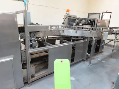 BEVCO low level gripper rinser with fallen bottle detector