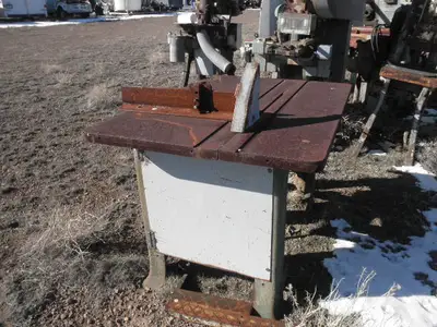 USED METAL TABLE SAW -