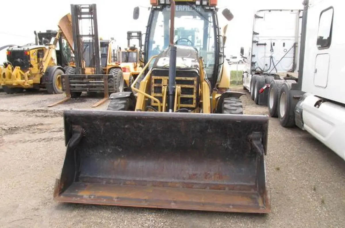 Used 2009 CATERPILLAR 414E IL SKIP /LANDSCAPE LOADER Wheel Loaders Manitoba CA | Conquest Truck & Auto Sales #1421330