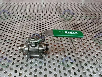 USED INLINE INDUSTRIES STAINLESS STEEL BALL VALVE W/ 1/2" SANITARY FITTING