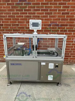 USED ROTEC PISTONMACHINE FOR VIAL CAPS / STOPPERS W/ VIBRATORY FEEDER BOWL