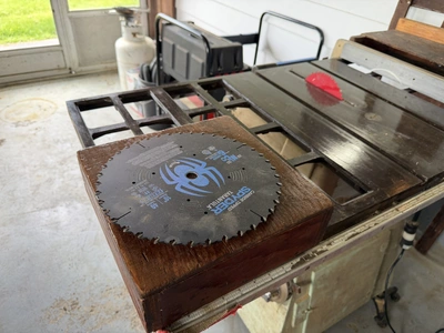 (1) Craftsman 10" table saw with stand, includes extra blades.