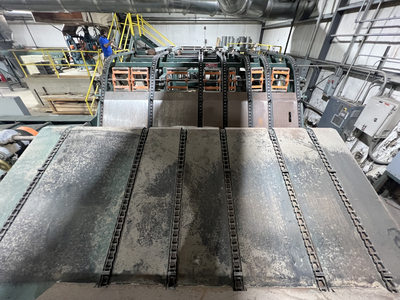 Automated Lumber Handling Pre-Breakup Incline Chain Deck