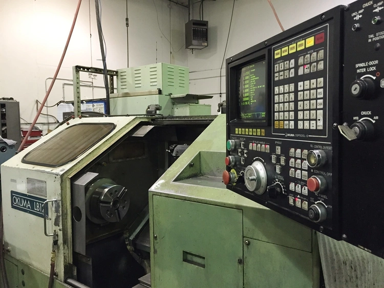 Used 1990 OKUMA LB-12 CNC Lathes Illinois US | Asset Exchange Corporation #20348