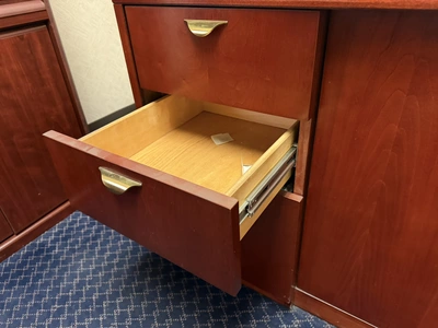 Contents of office furniture, includes (1) wood desk with glass top, 71" x 36", (1) wood credenza wi...