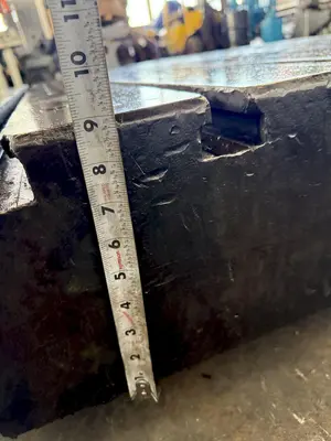 60" WIDE X 67" LONG X 9" THICK T-SLOTTED BOLSTER PLATE. STOCK # 1006324