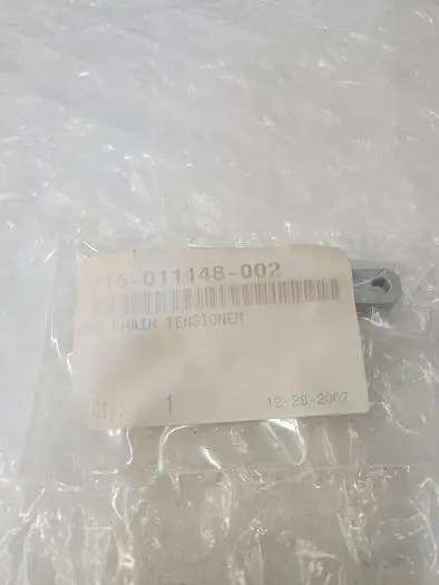 715-011148-002 ARM, CHAIN TENSIONER