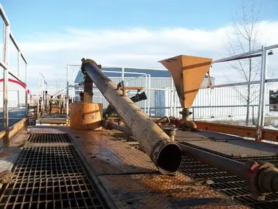 USED 20 M3 (120 BBL) SKID MOUNTED 2 COMPARTMENT MUD TANK