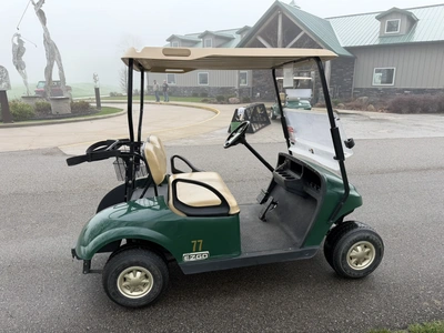(1) 2014 E-Z-Go golf cart with a Kawasaki gas engine, includes canopy, ball carrier, fold-down winds...