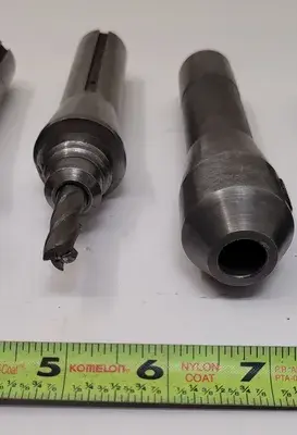 UNBRANDED R8 TOOL HOLDERS, SET OF 6, INCLUDING 1/4IN, 3/8IN, 1/2IN, AND 3/4IN SIZES.